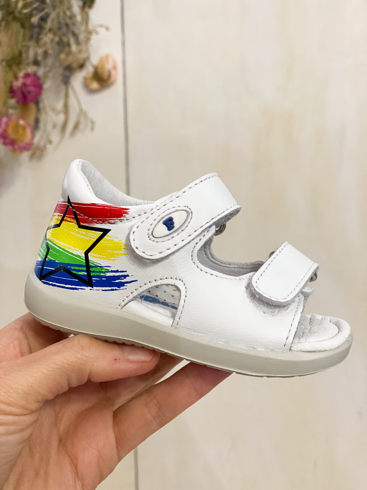 Sandali in pelle bianca con stella laterale