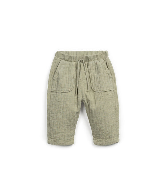 Pantaloni in tessuto goffrato colore verde