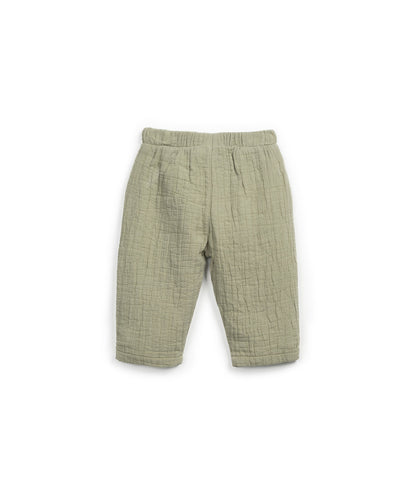 Pantaloni in tessuto goffrato colore verde