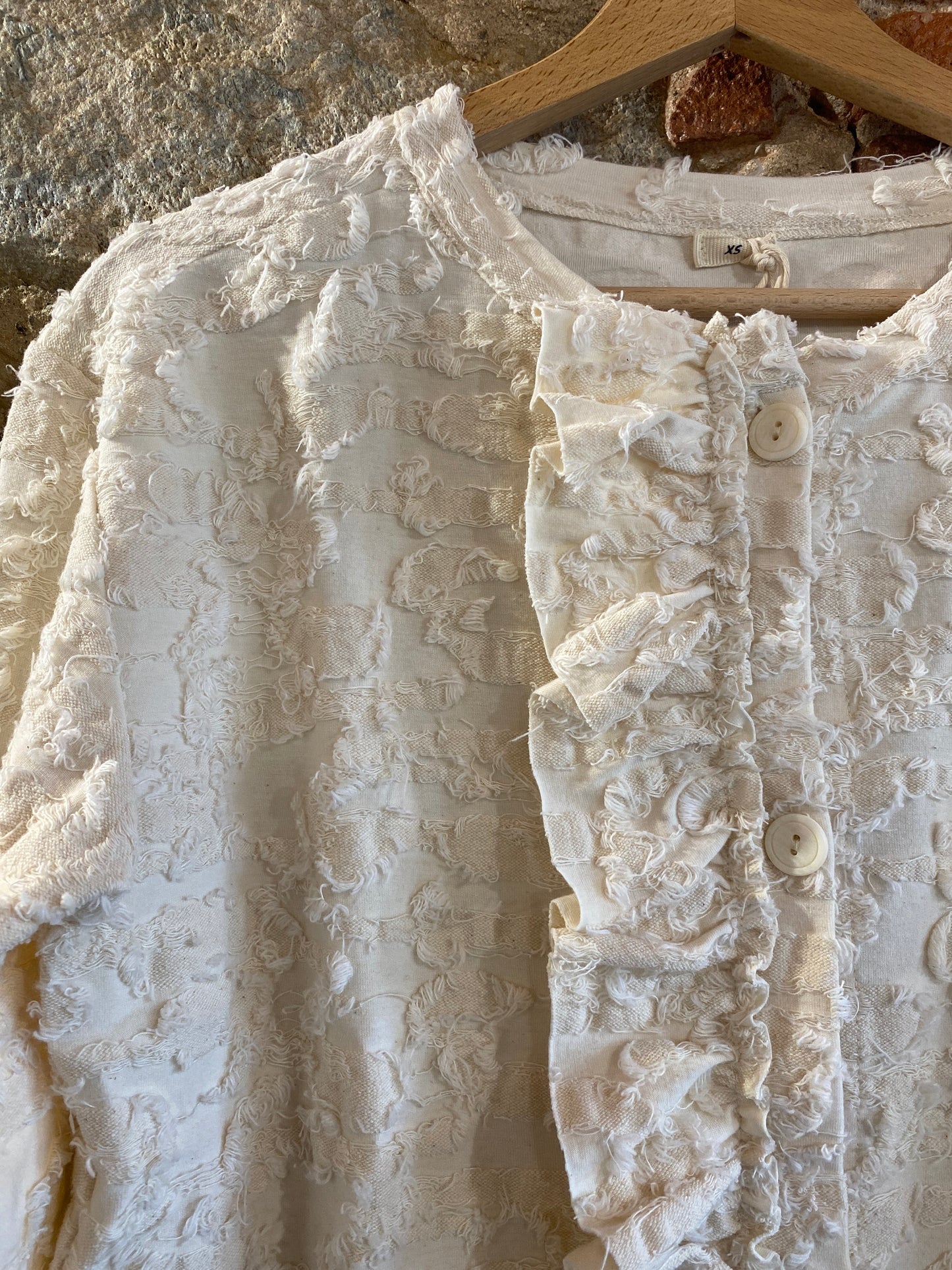 Giacca in felpa di cotone sfilacciata colore panna
