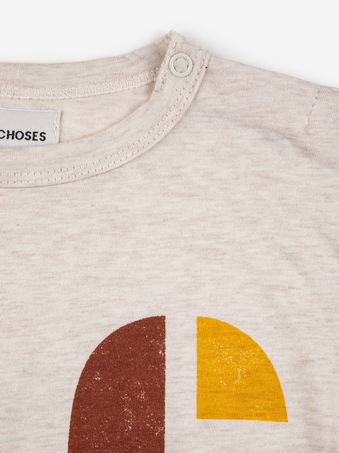 T-shirt bambino in cotone beige stampa B C