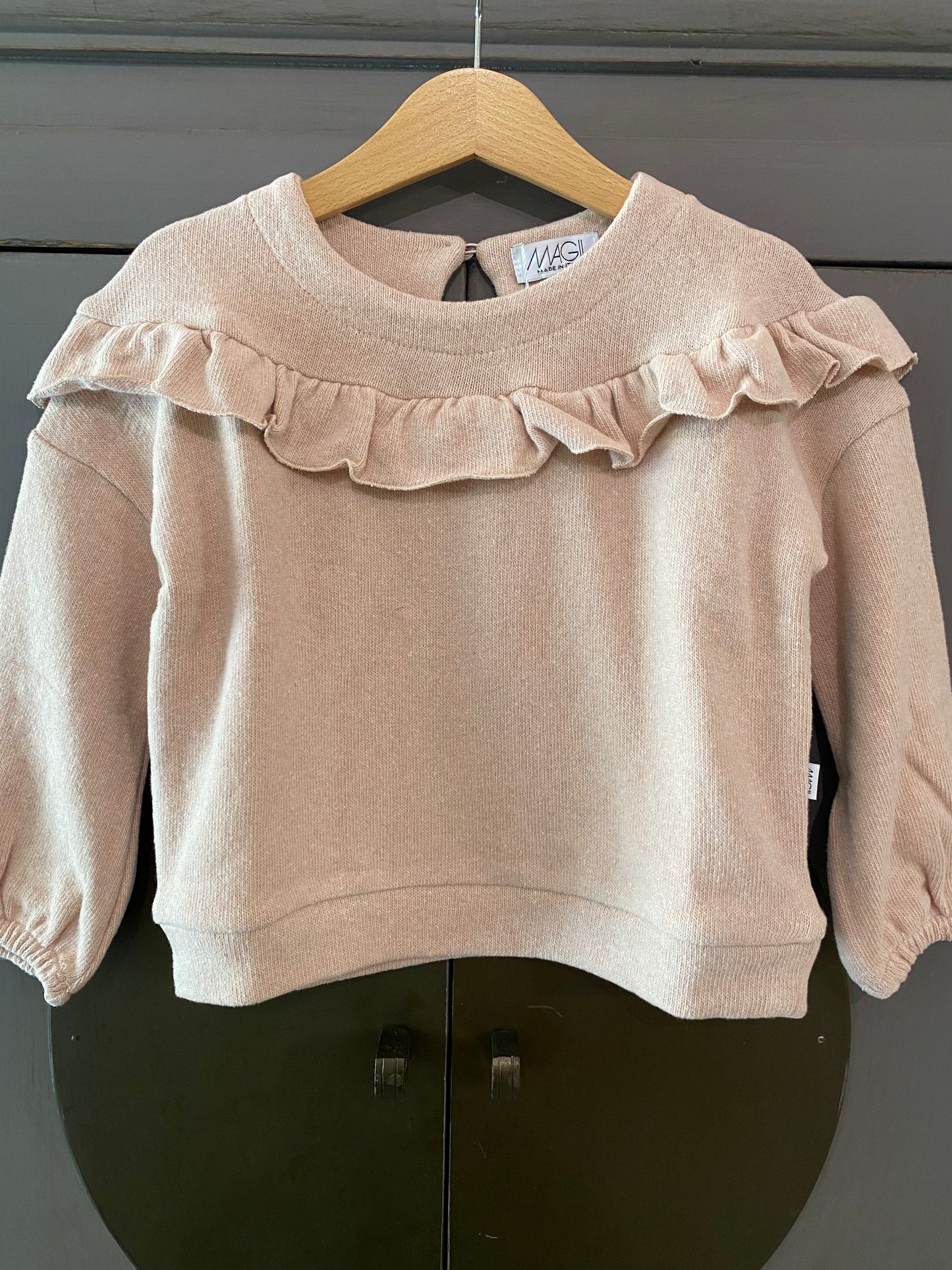 Maglia caldo cotone con volant colore rosa chiaro