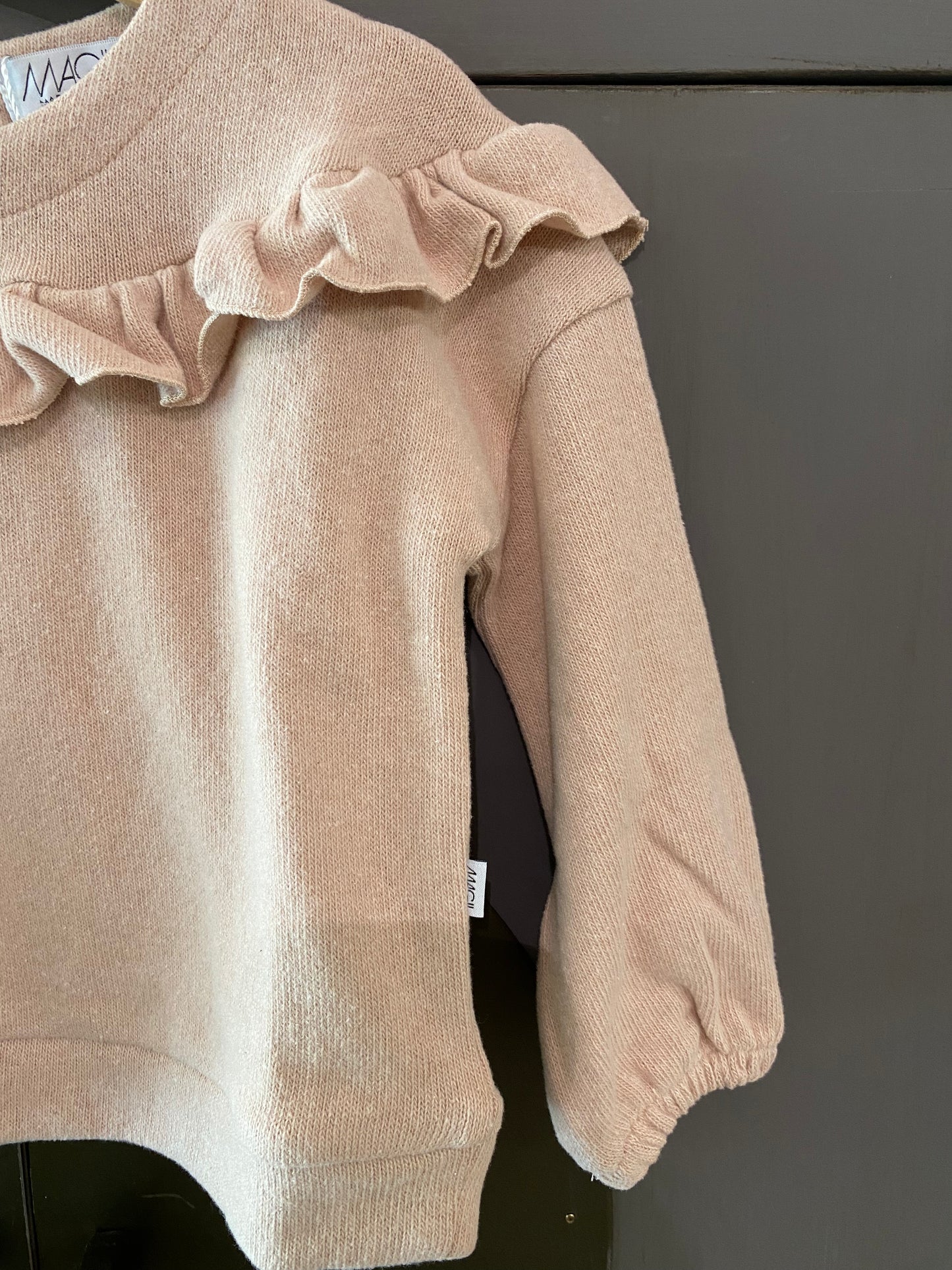 Maglia caldo cotone con volant colore rosa chiaro