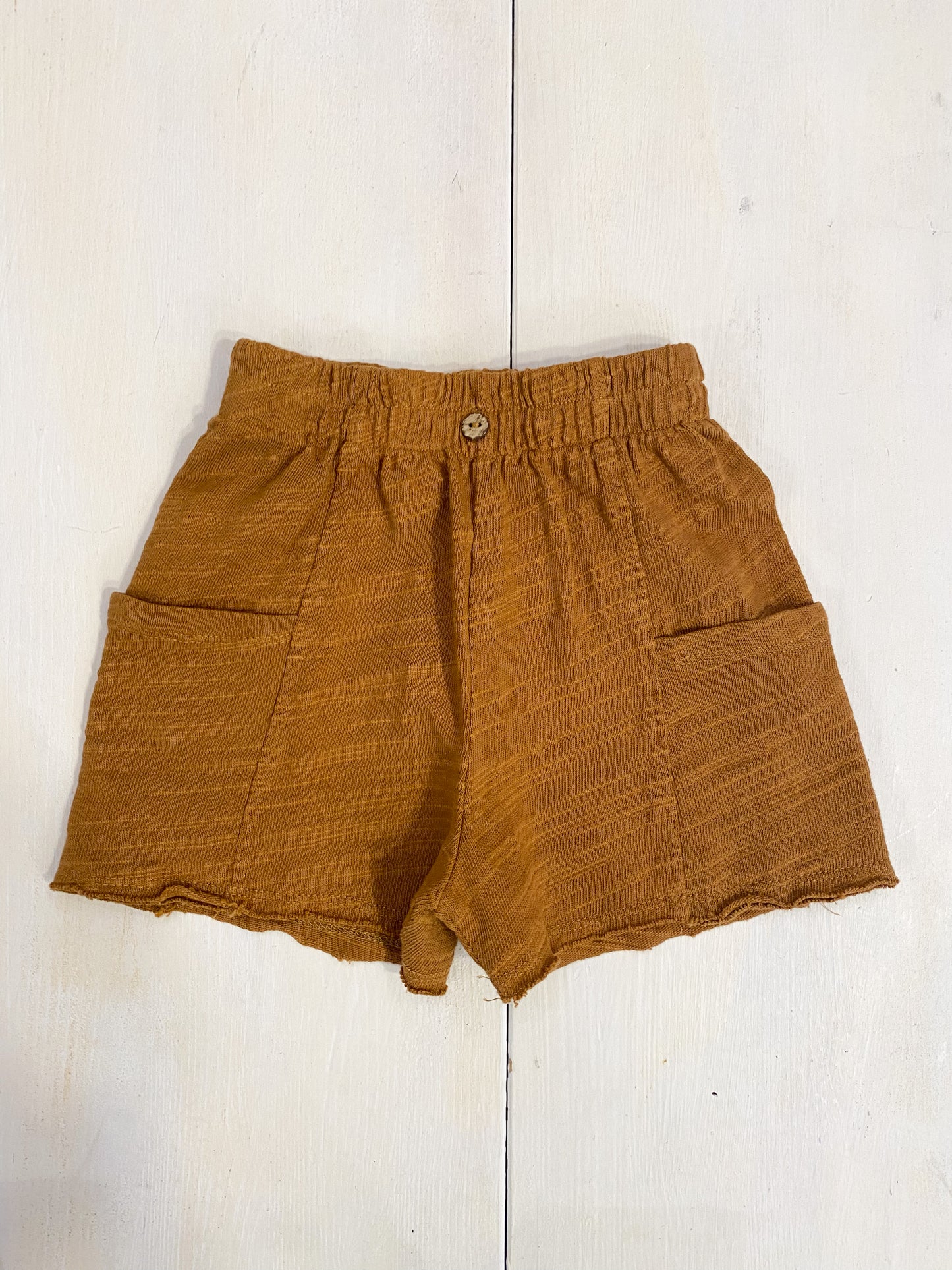 pantaloncino in maglia di cotone colore curcuma